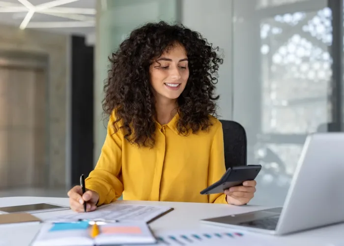 Tax advisor reviewing financial documents with client